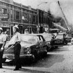 By midafternoon, with 12th Street on fire from stem to stern and undermanned Detroit police rapidly becoming overwhelmed, Governor George Romney decided to call in the National Guard.