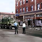 Detroit Police and Guardsmen conduct a sweep on a looted 12th Street. 