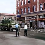 
Detroit Police and Guardsmen conduct a sweep on a looted 12th Street. 