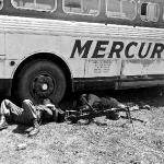 After the most hectic week of their young lives, two Guardsmen sleep the sleep of exhaustion on Detroit's West side. 