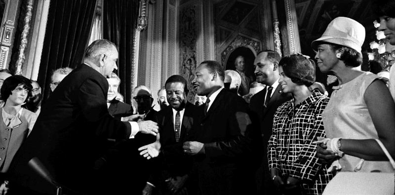 President Lyndon Johnson greets Martin Luther King